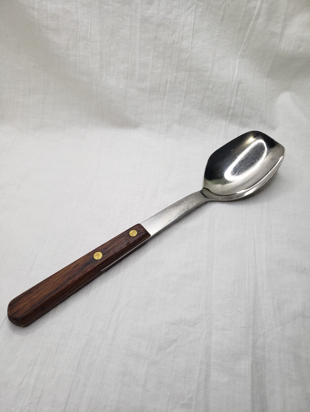 Vintage Walnut Handled Stainless Steel  Serving Spoon 10 Inches Long Riveted